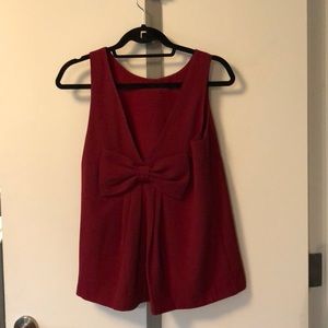 Dark red top with low back and cute bow!